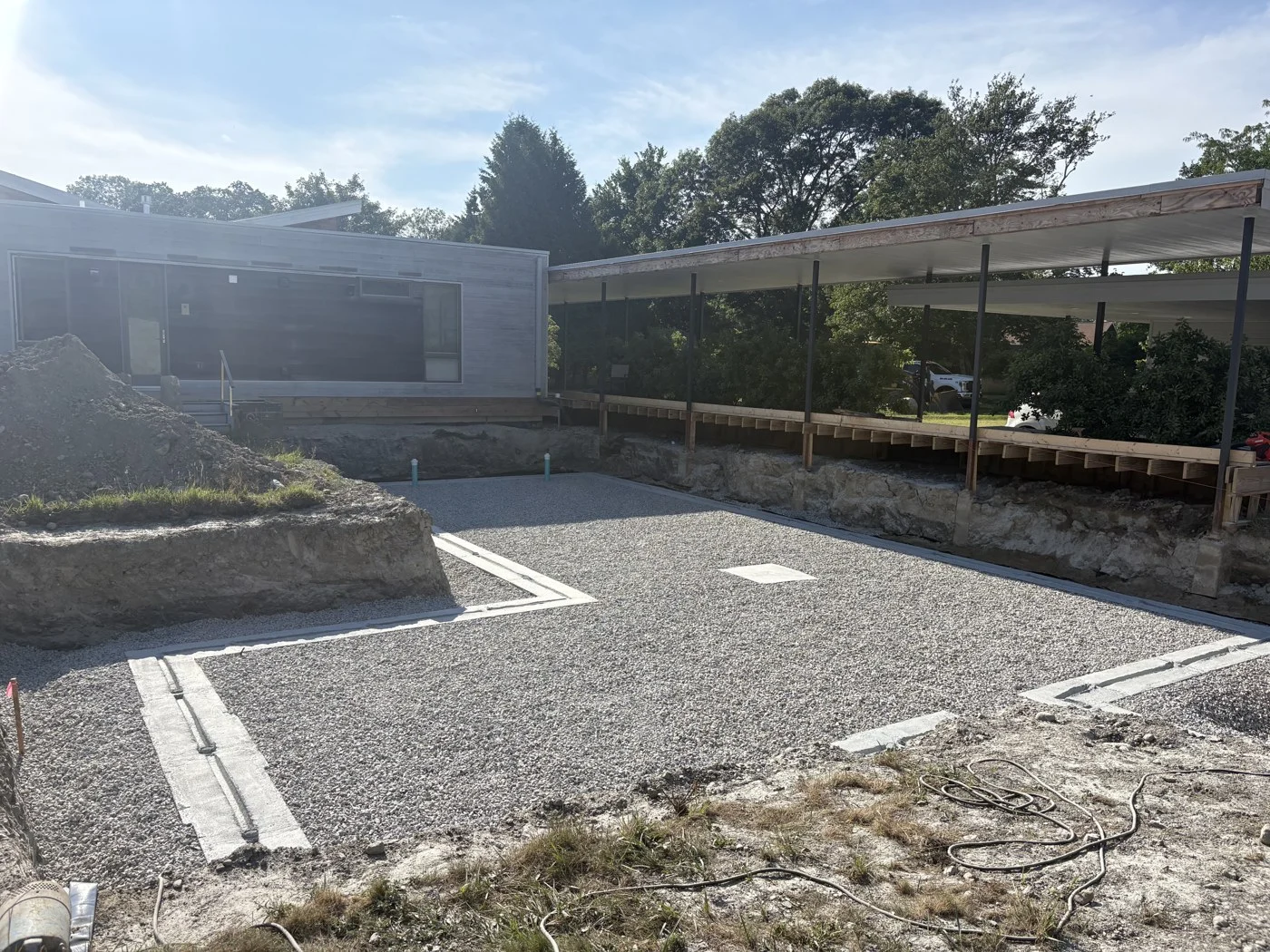 Foundation excavation with gravel base and footings