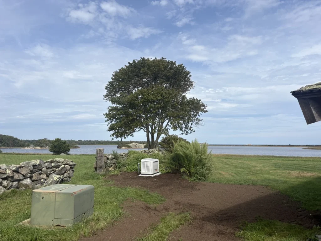 Graded landscape edge beside a waterfront building