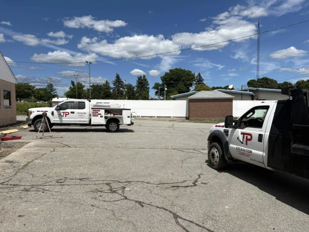 JP Excavation service trucks at a project site